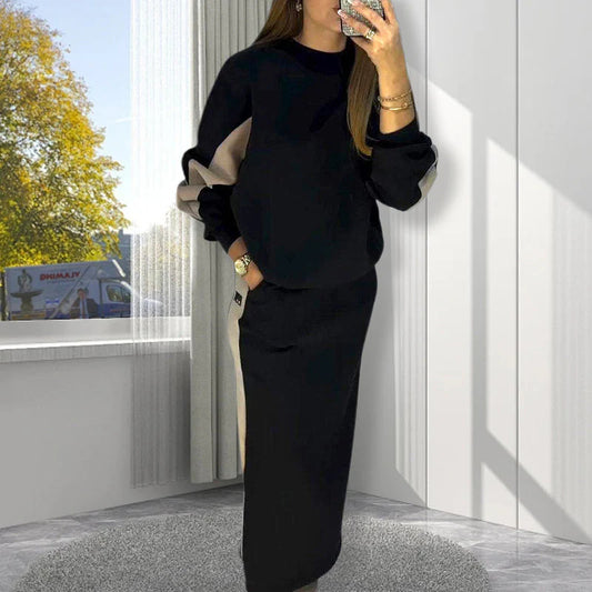 Voľný súprava z farebne blokovaného topu s dlhým rukávom a rozparkovej sukne