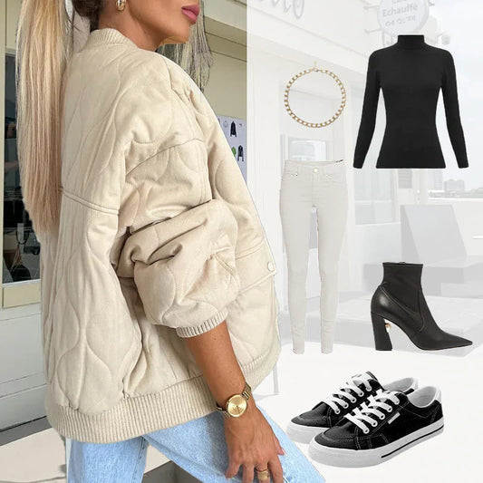 Voľná, hrubá a teplá jednofarebná bomber bunda.